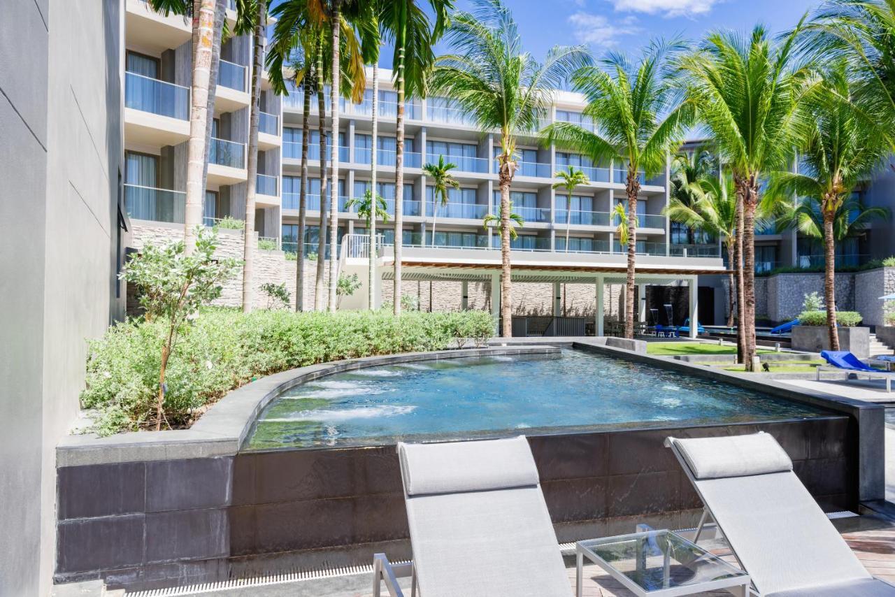 Patong Oceanfront Beach Resort - Sha Extra Plus מראה חיצוני תמונה The pool at the Hilton