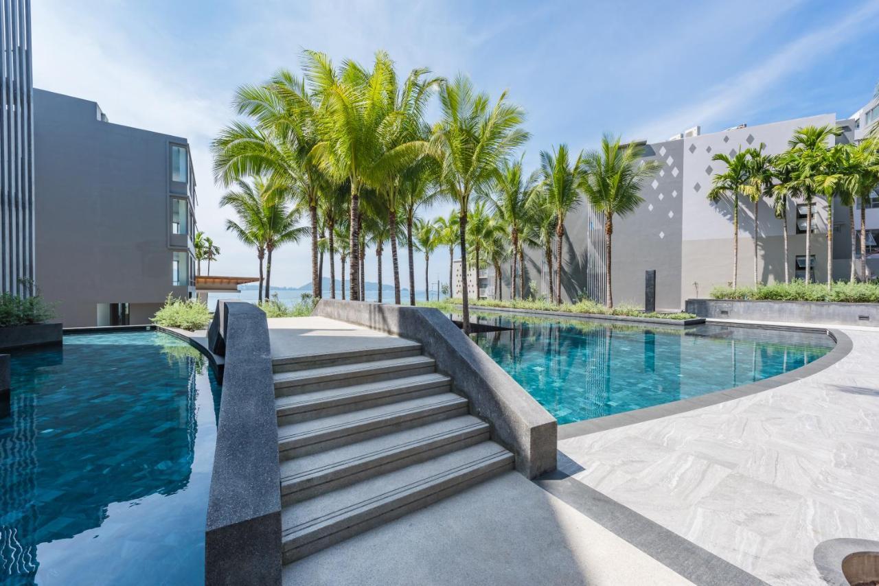 Patong Oceanfront Beach Resort - Sha Extra Plus מראה חיצוני תמונה The swimming pool at the resort